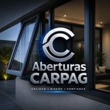 Aberturas CARPAG logo sign on modern glass entrance with tagline Calidad Diseño Confianza